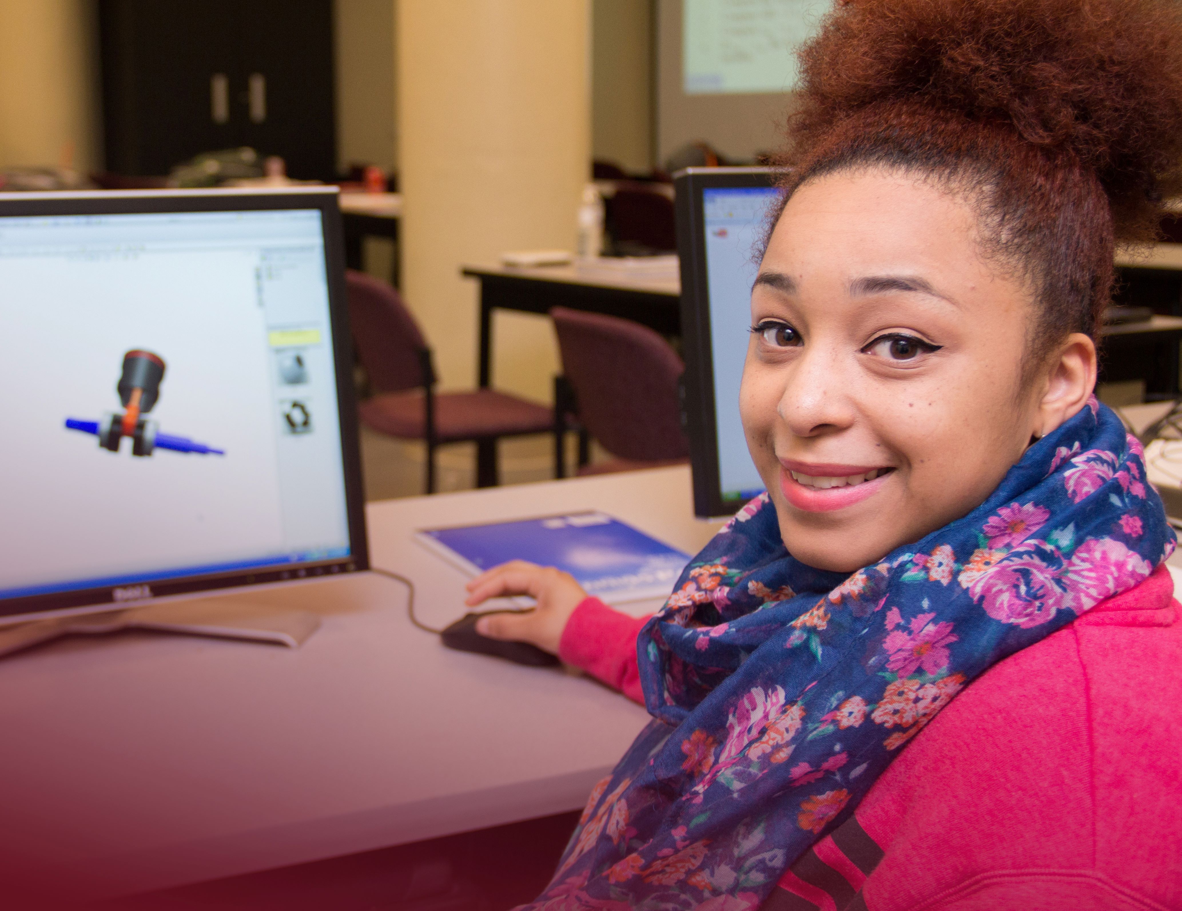 HACC engineering student using a computer