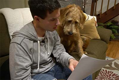 Quinn Studying With Dog